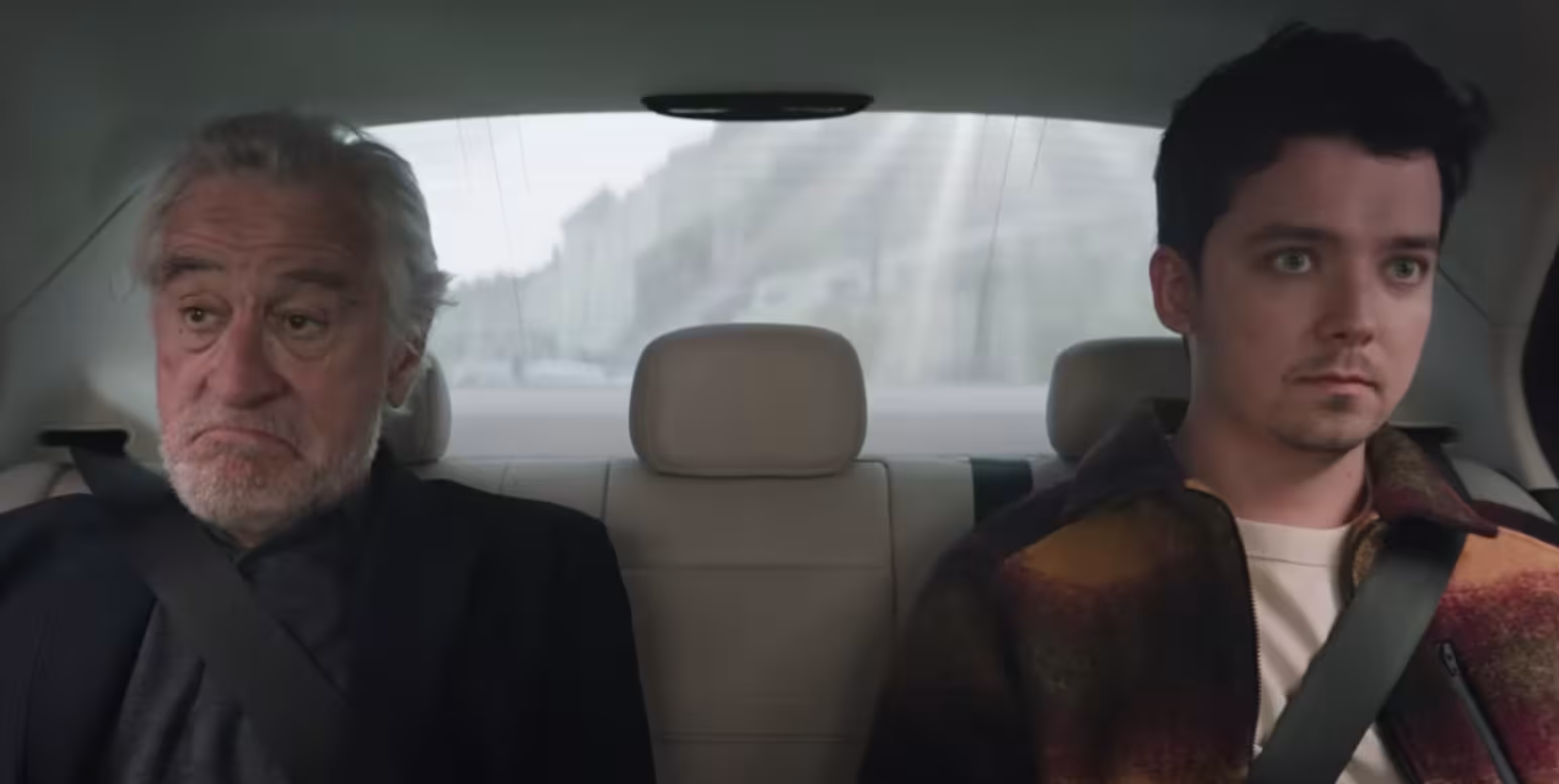 Robert De Niro and Asa Butterfield ride in the backseat of an Uber